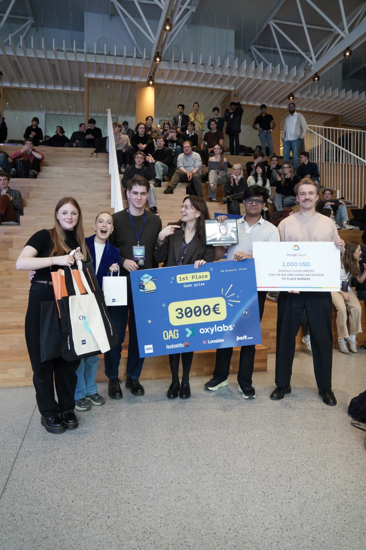 FocusAI team receiving first place and Google Cloud prizes