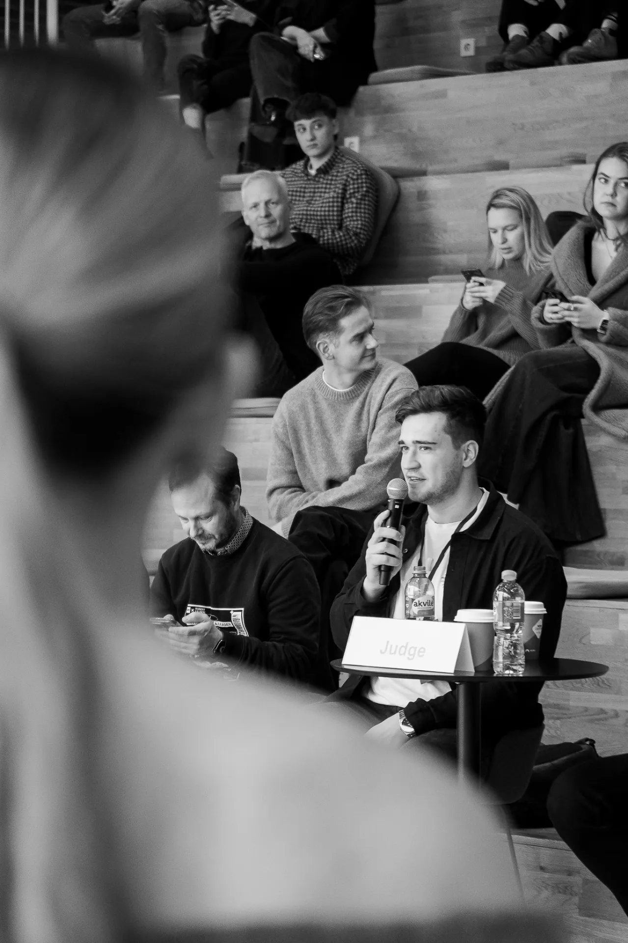 Gabrielius Mažeikis from WhyTheDuck asking questions during judging