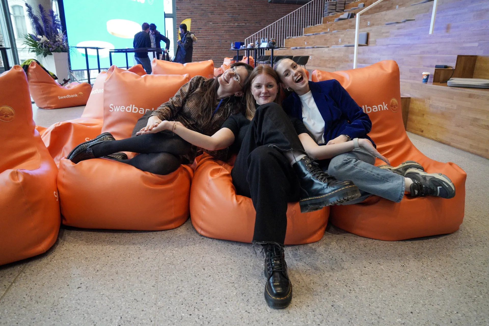 Organisers relaxing on beanbags after the event