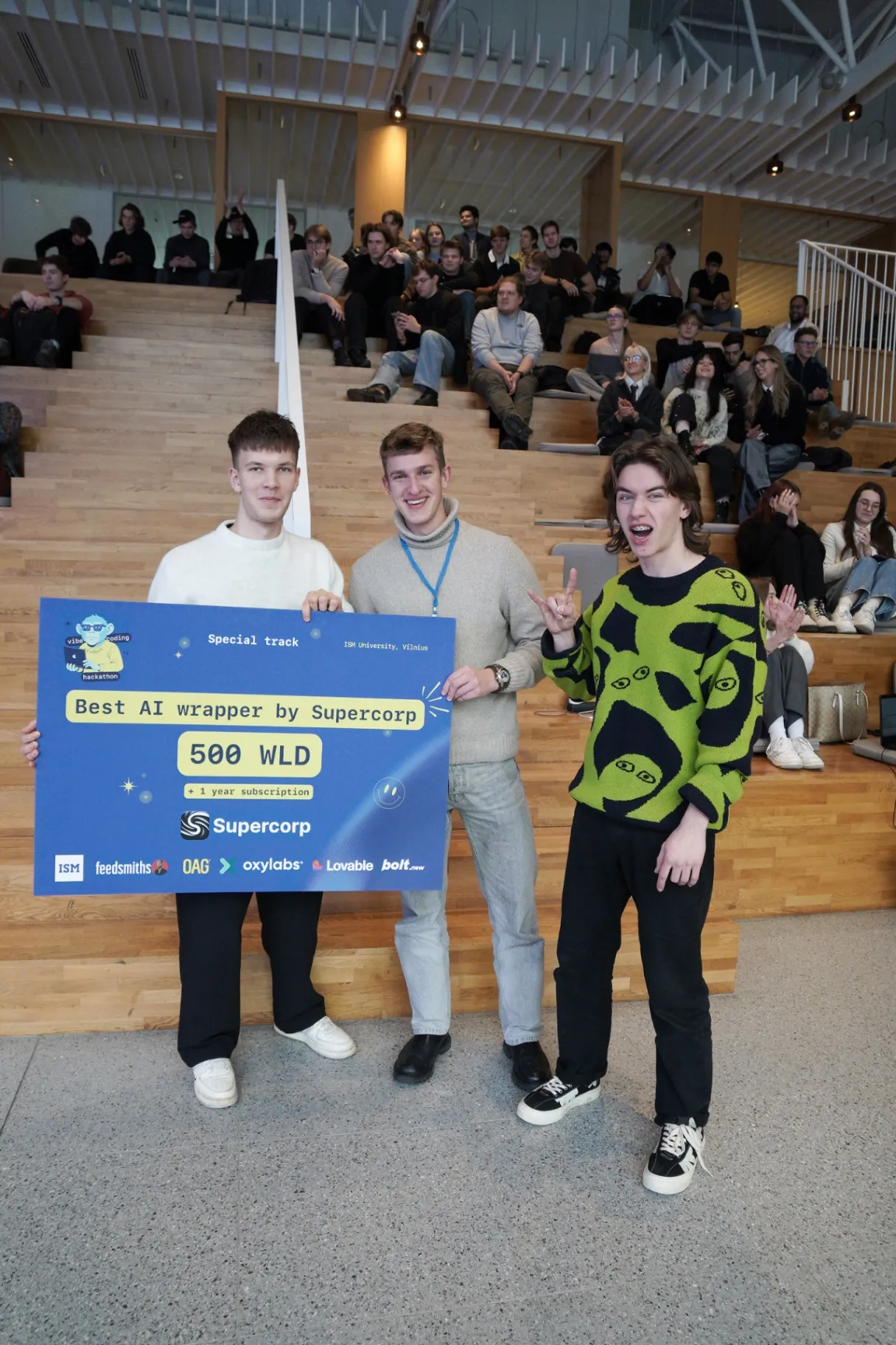 Planaging team receiving Best AI Wrapper prize from Supercorp