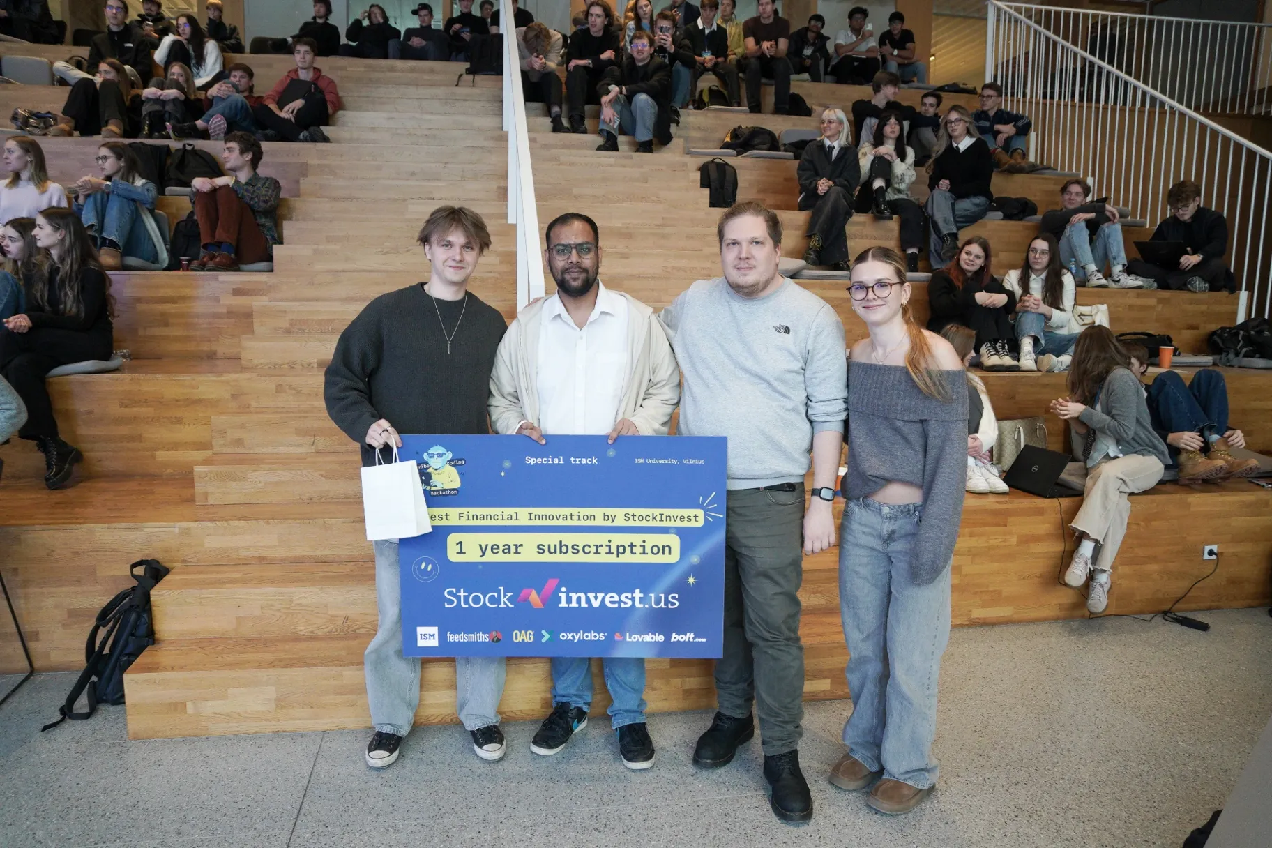 FlipAI and INNVOS teams receiving prizes for Best Financial Innovation from StockInvest.US